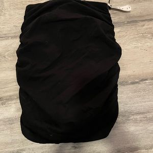 Aritzia brand TNA black ruched mini skirt
